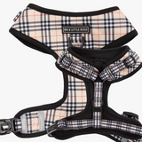 Plaid dog harness with visible brand name on a white background